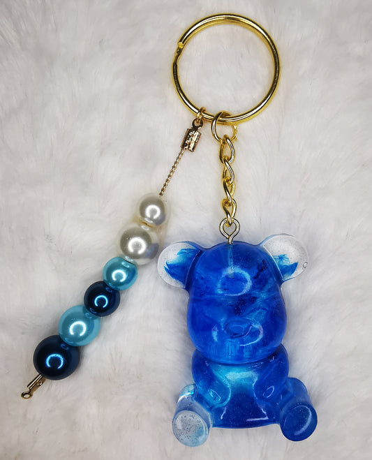 Porte clé ourson bleu transparent