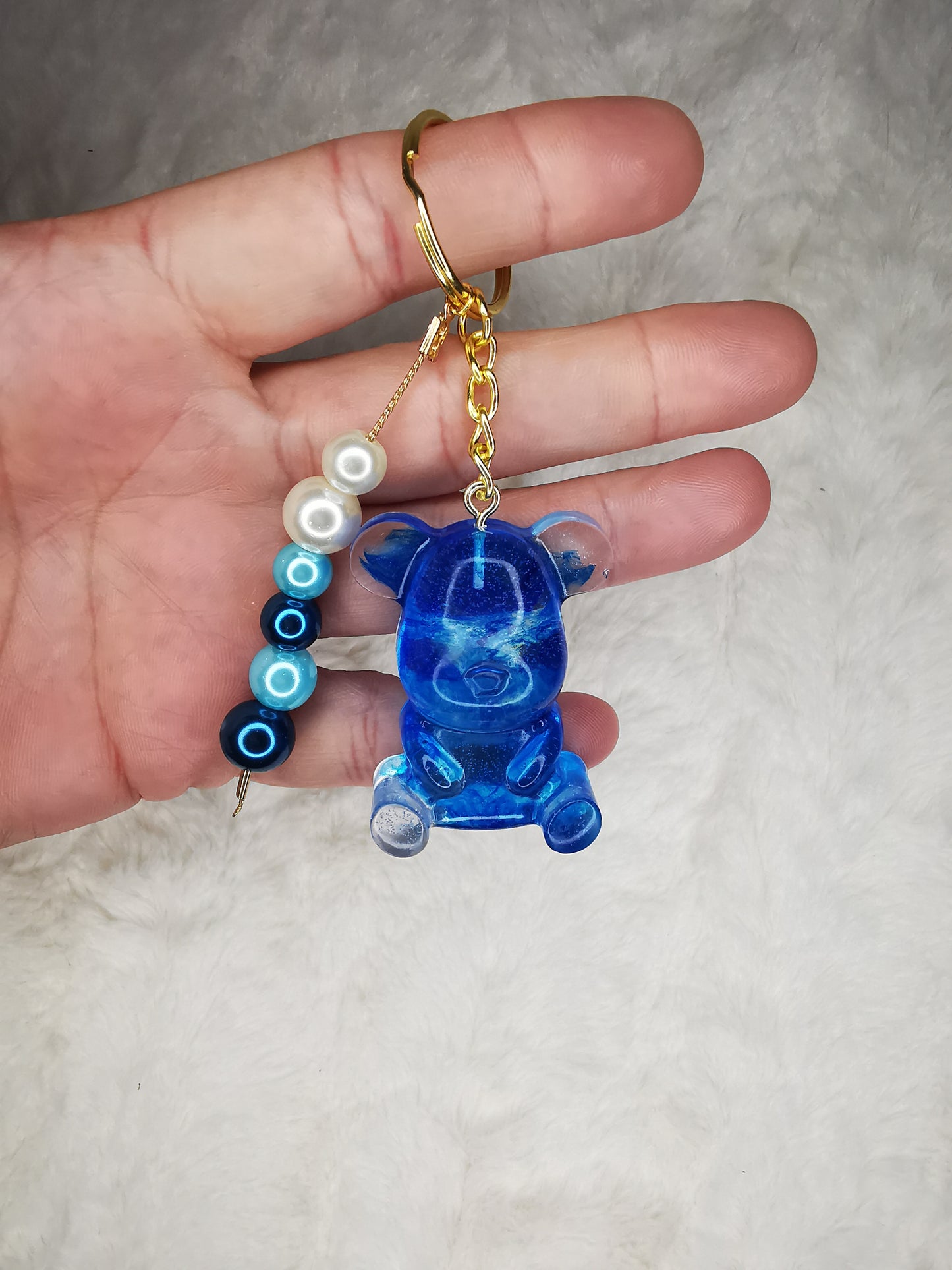 Porte clé ourson bleu transparent