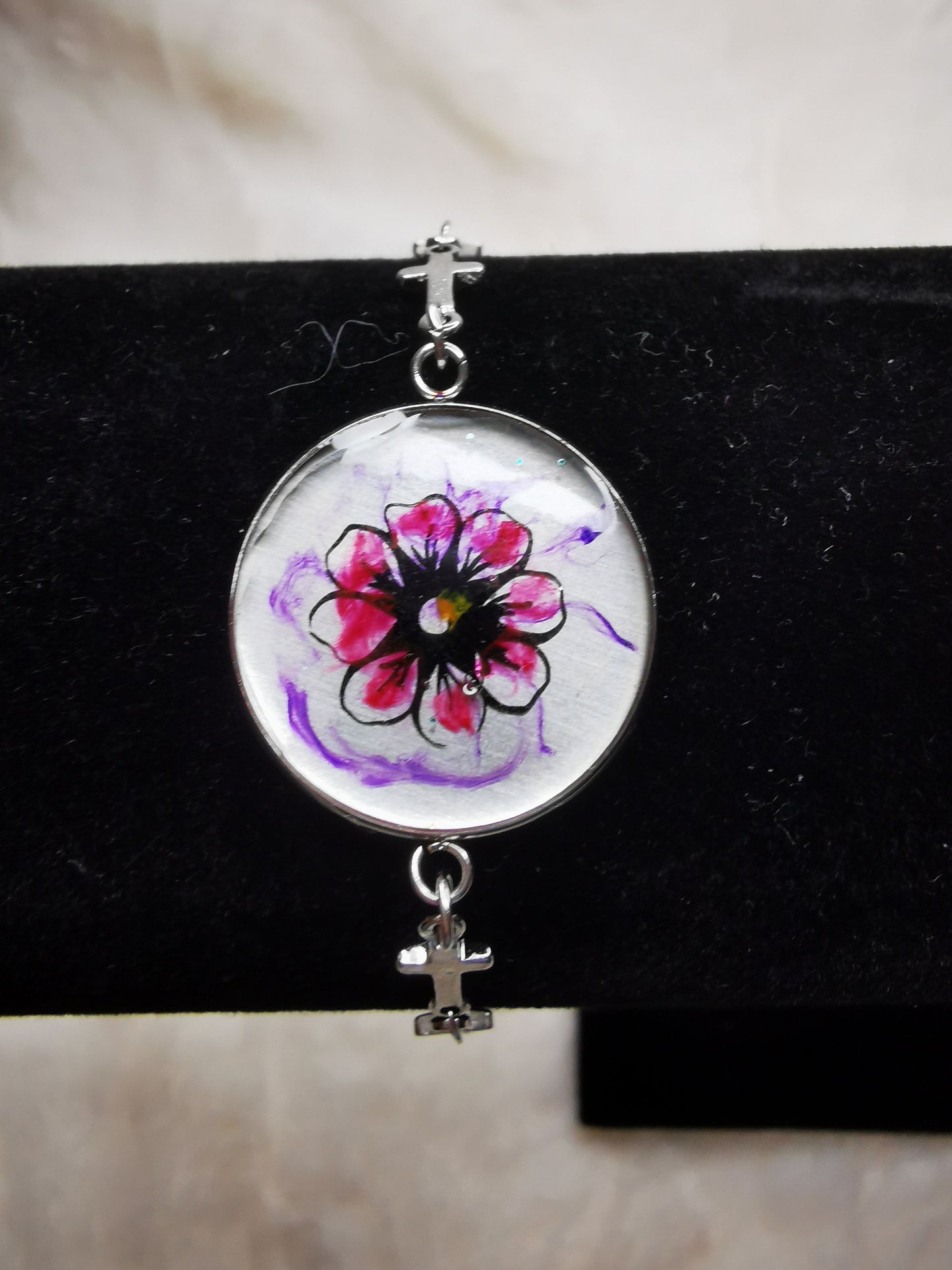bracelet croix avec fleur