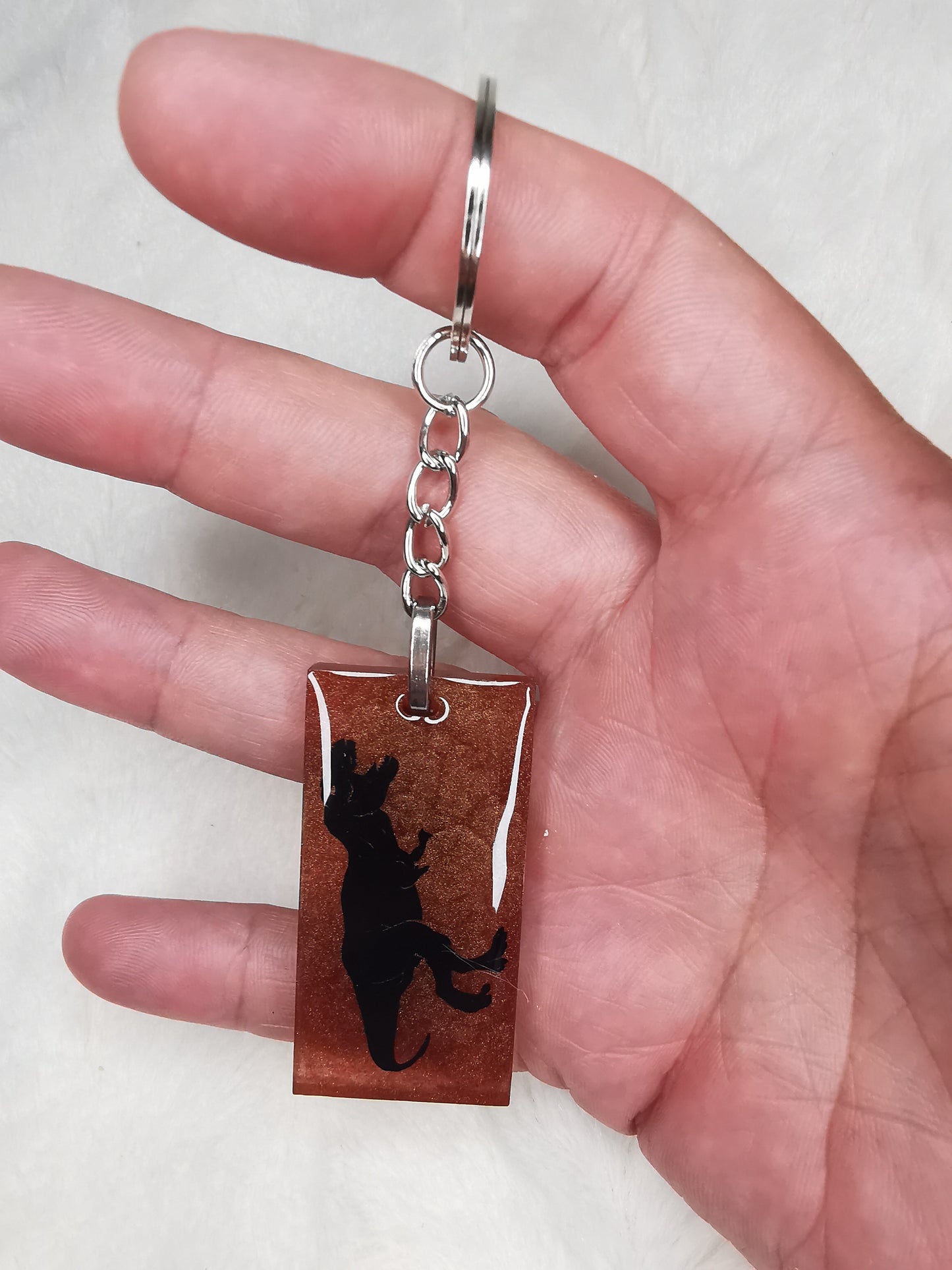 Porte clé marron dinausaure