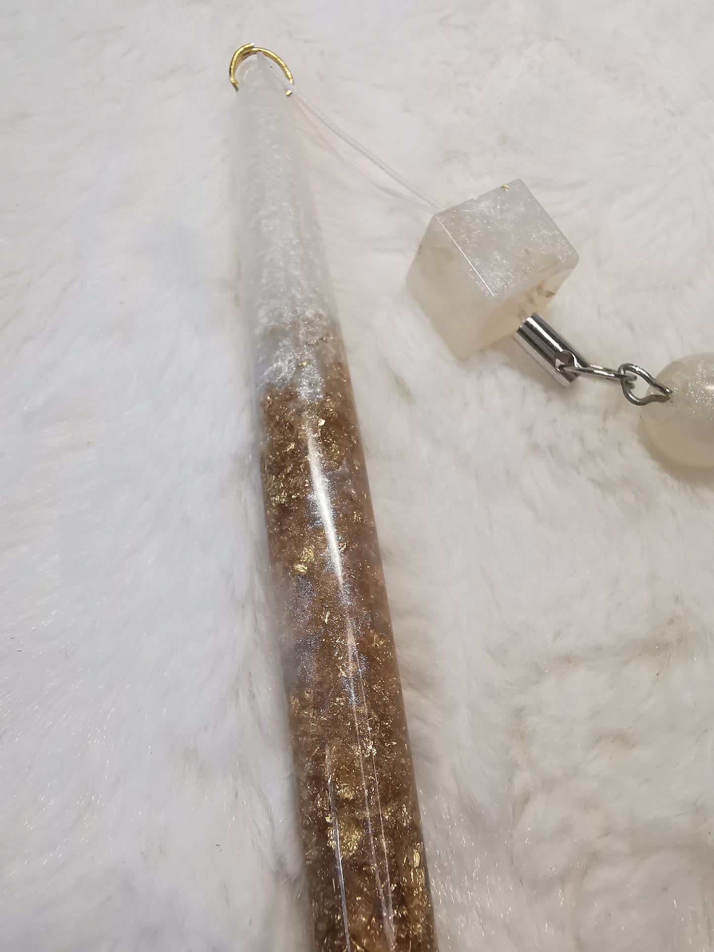 stylo avec breloque