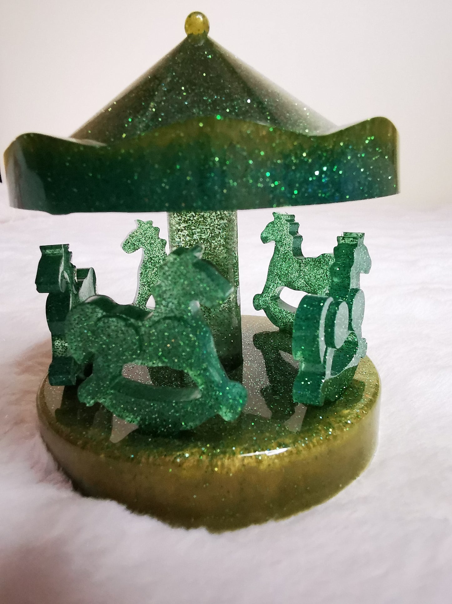 carrousel décoratif vert pailletté