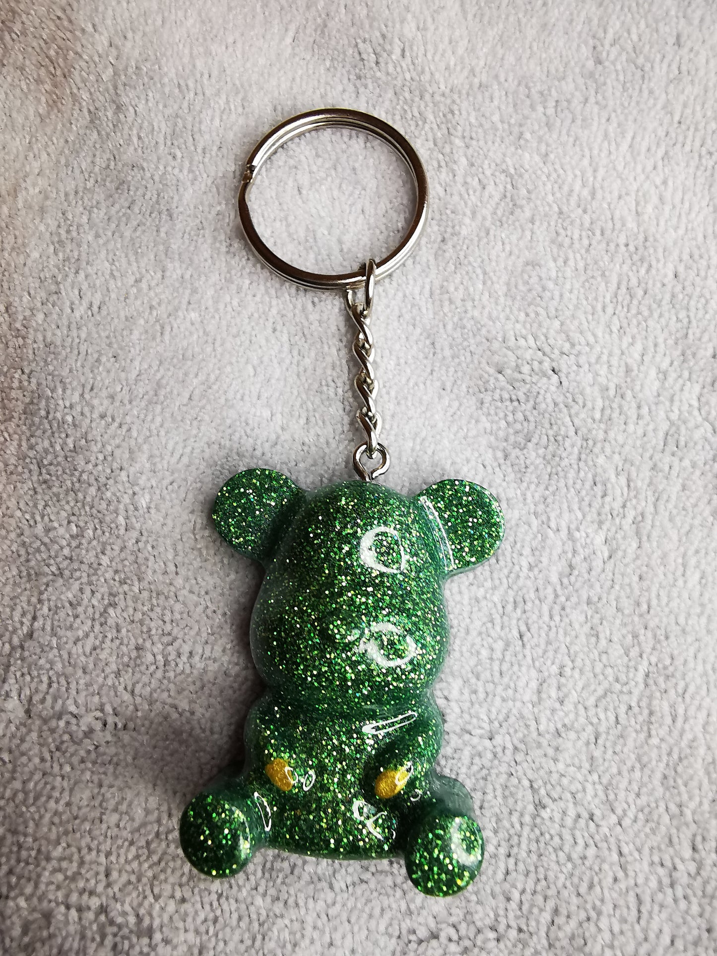 Porte clé ourson vert pailleté