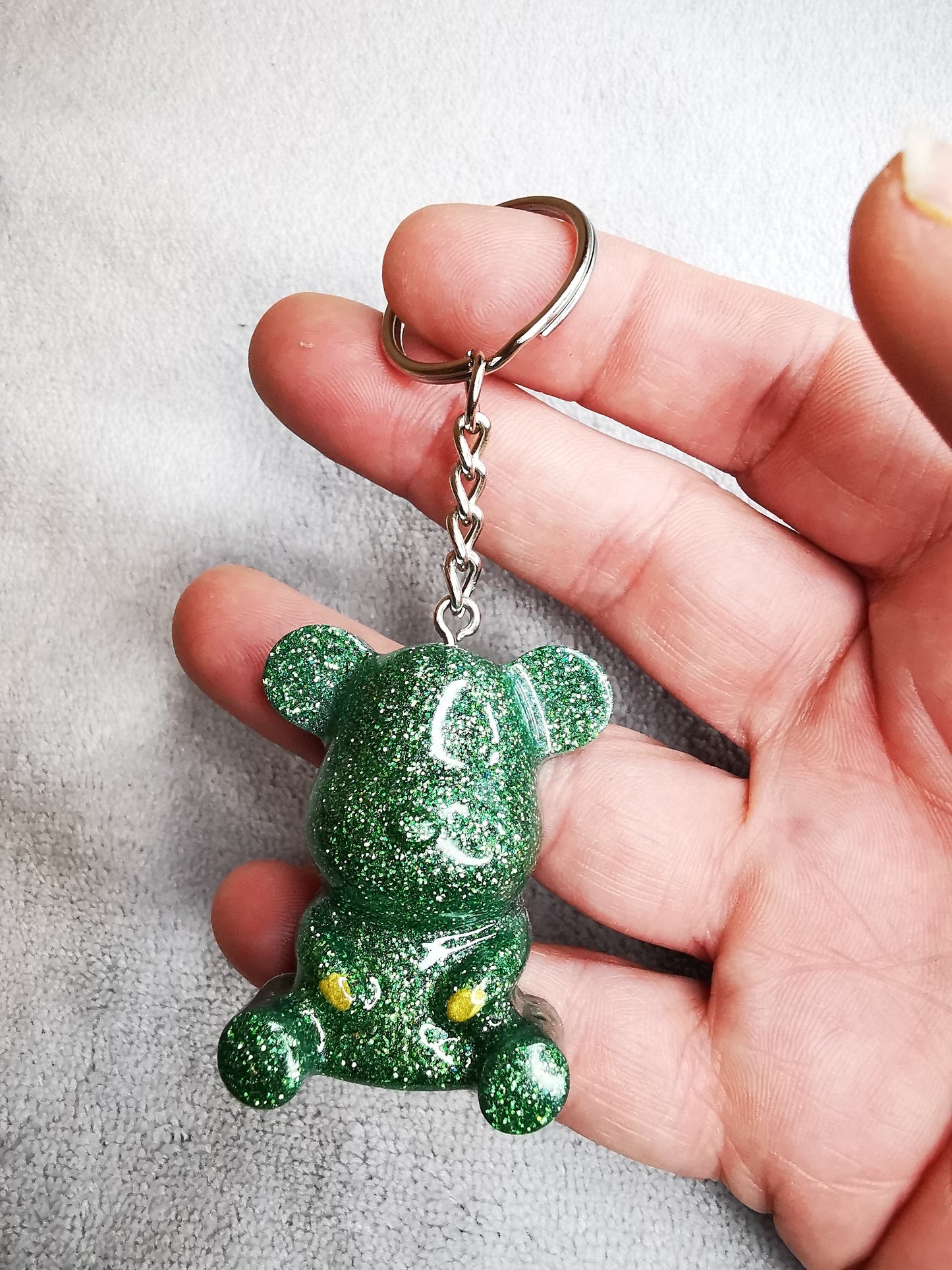 Porte clé ourson vert pailleté