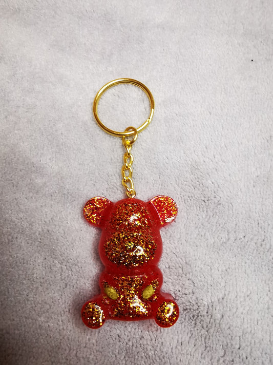 Porte clé ourson rouge/rose pailleté or