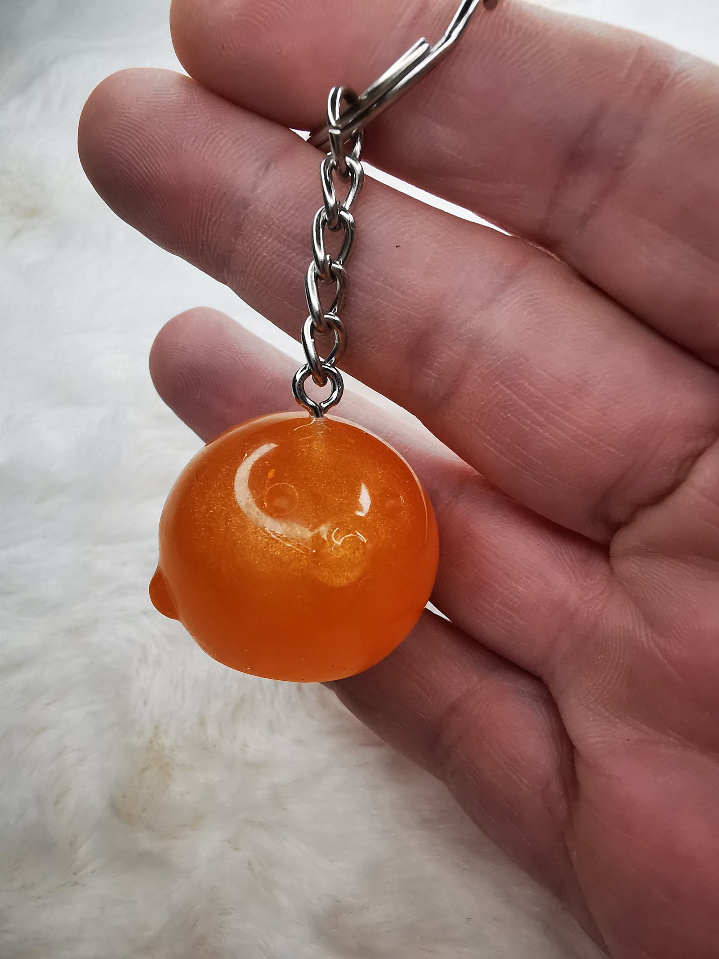 Porte clé pingouin orange fluo