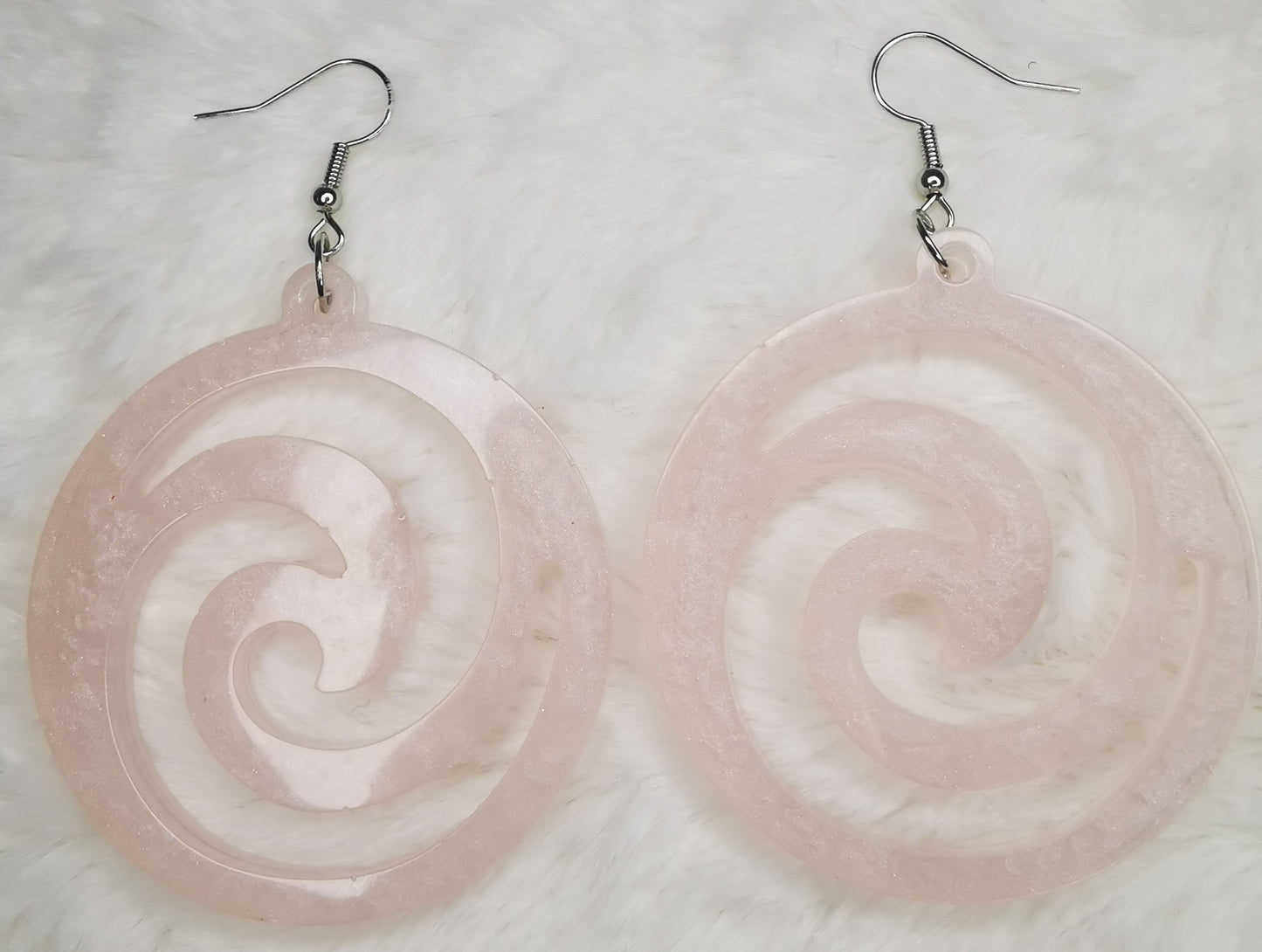 Boucles d'oreilles spirale rose pale