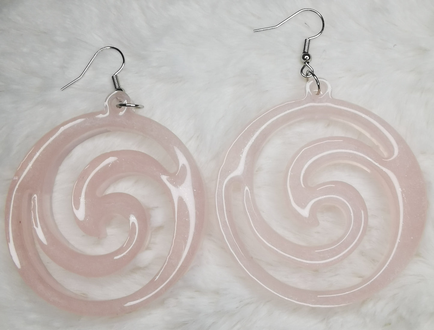 Boucles d'oreilles spirale rose pale