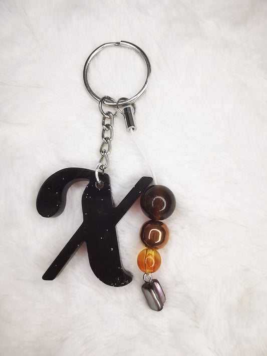Porte clé lettre X monrro  foncé