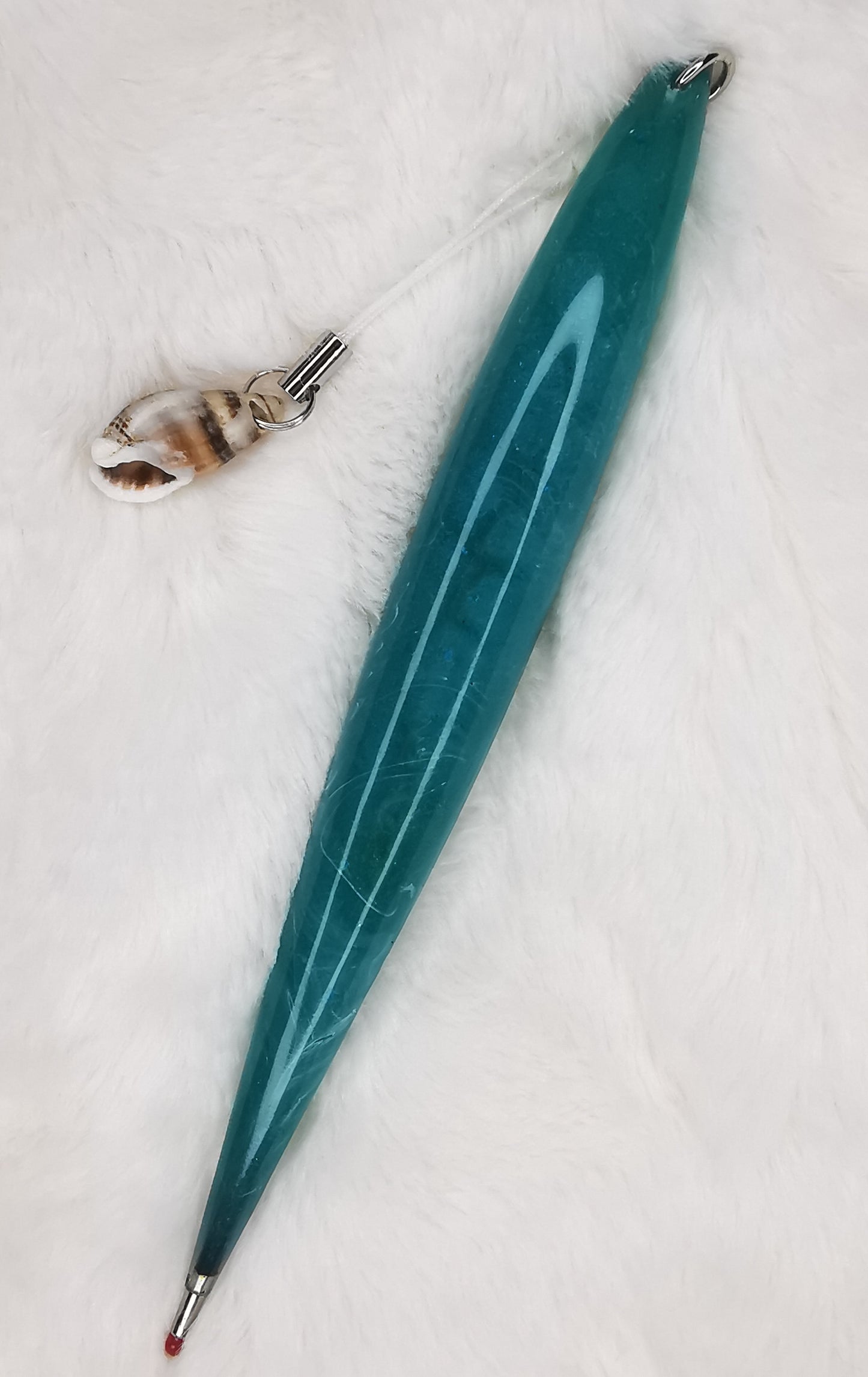 Stylo vert avec coquillage