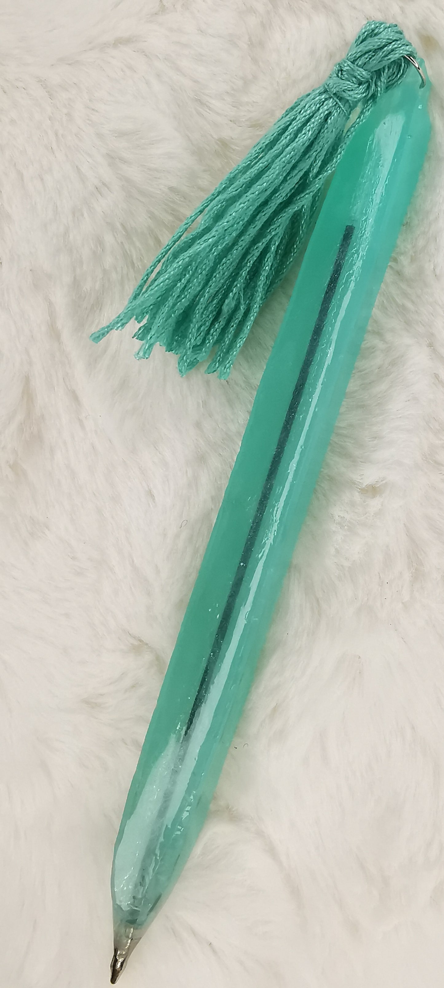 Stylo vert avec pompon