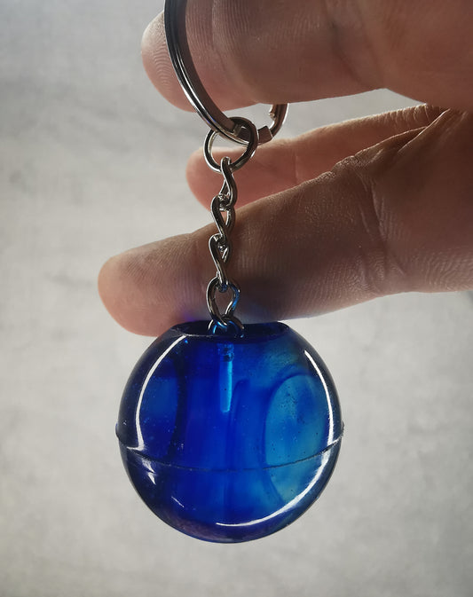 Porte clé boule bleu foncé