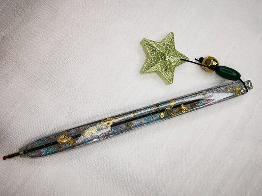 stylo et breloque